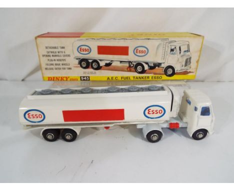 Dinky Toys - A Dinky toys # 945 A.E.C Fuel Tanker ESSO. White cab and tanker with "ESSO" decals and folding bogie wheels. In 