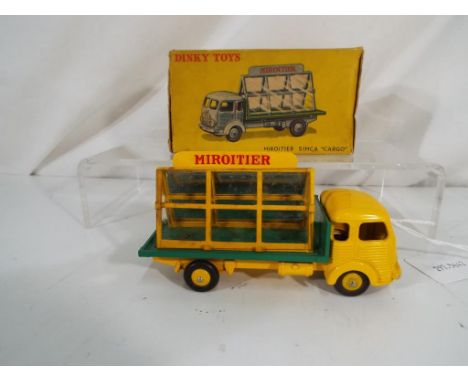 Dinky Toys - A French Dinky Toys # 33C Miroitier Simca "Cargo" (Simca glazier's truck), yellow cab, chassis and hubs, green f