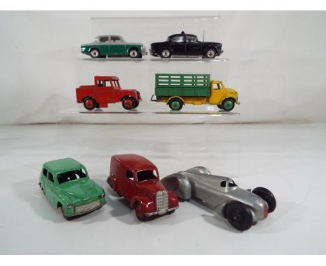 Dinky Toys - 7 unboxed, playworn model motor vehicles by Dinky Toys to include Auto Union Racing Car # 23D, Dodge Farm Produc