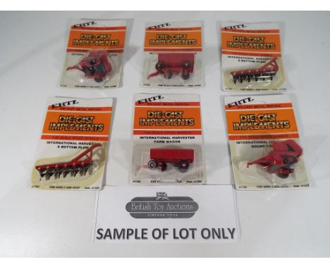Ertl - Approximately 48 diecast metal implements by Ertl in 1:64 scale to include "International Harvester Round Baler", "Int