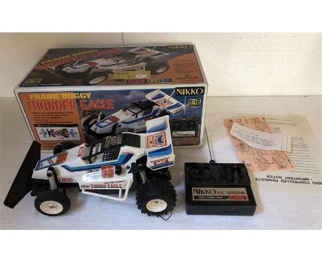 A radio controlled Frame Buggy Thunder Eagle by Nikki. Excellent condition 1/18 scale.