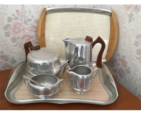 Picquot ware tea service on tray together with another tray