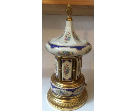 Brevettato ceramic musical cigarette dispenser. Swiss made movement. 38cms h 