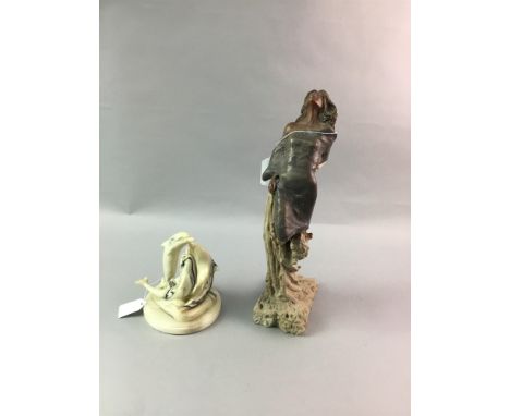 CONTEMPORARY SCULPTURE OF A WOMAN ON A TREE, along with a group of dolphins (2)