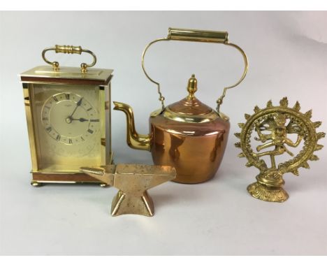 BRASS AND A COPPER KETTLE, along with a carriage clock and other brass ware including an Indian Icon