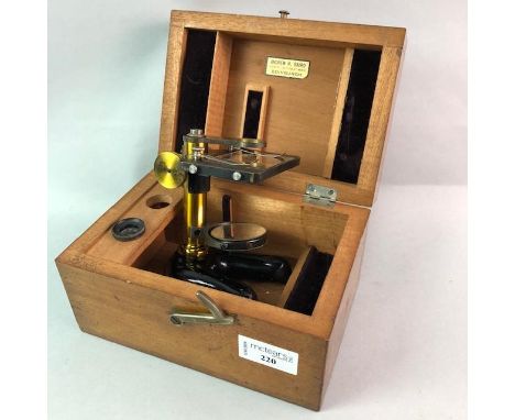 BRASS AND LACQUERED MICROSCOPE IN BOX BY E. LEITZ WETZLAR, along with vintage cameras