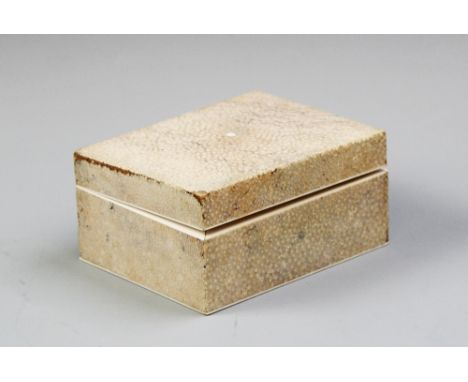 An Art Deco shagreen cigarette case, the rectangular hinged cover opening to reveal a vacant interior, 6cm  x 12cm W x 10cm D