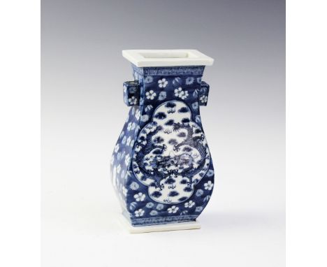 A Chinese porcelain blue and white Hu vase, Kangxi four character mark, of typical form and decorated with two quatrefoil pan