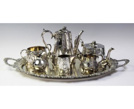 A four-piece silver plated tea service, comprising; a teapot, hot water jug, sugar bowl and milk jug, each of tapering oval f