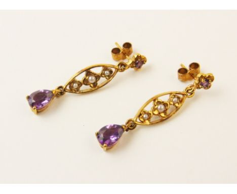A pair of amethyst and pearl set 9ct gold drop earrings, each designed as a quatrefoil flower set with an amethyst, suspendin