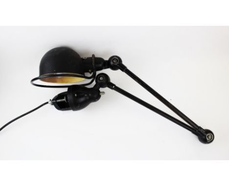 A French Jielde twin arm work lamp, mid 20th century, the shade of domed form incorporating a tubular grip ring and toggle sw