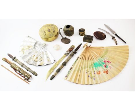 A collection of Japanese objects of virtue, Meiji period and later, to include; an ivory shibayama inlaid reel case, 4.5cm di