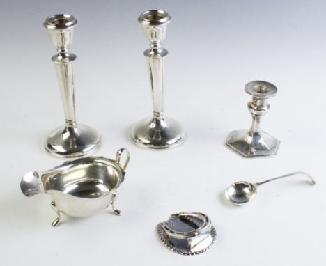 A selection of silver tableware to include a Victorian silver paperclip in the form of a horseshoe by Stuart Clifford, London