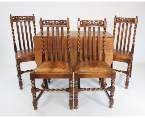 A set of six 17th century revival oak dining chairs, circa 1920, each with a carved open work crest rail above a lath back fl