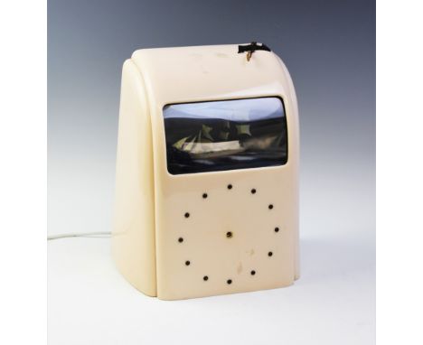 A 1940's Vitascope automation electric mantel clock, the Art Deco style Bakelite case with a rectangular window displaying a 