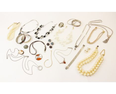 An assortment of vintage and modern costume jewellery, to include a silver engraved bangle with marks for Chester 1940, a Cel