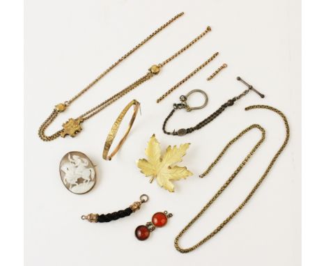 A selection of Victorian and later jewellery, to include, a yellow metal hinged bangle, the central tapering panel with engra