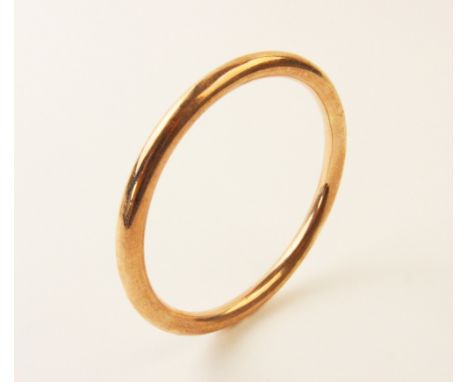 A 9ct rose gold slave bangle, plain polished exterior, 7.5cm diameter, weight 12.5gms For condition information please view t