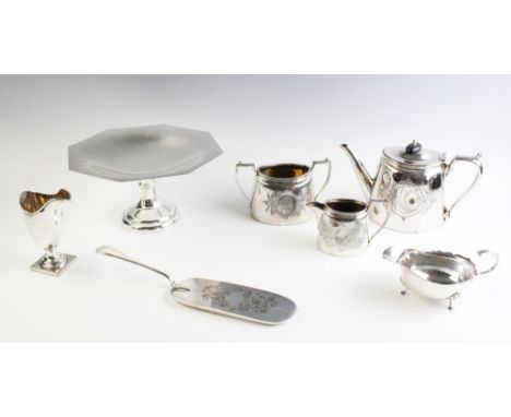 A selection of white metal table wares, to include, a George III style sauce boat by Adie Brothers, a three-piece tea service