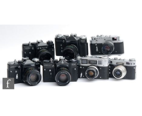 A collection of Russian cameras, to include a Zorki 6, with original manual, box and receipt dated 1968, two Zenit EM, a Zeni