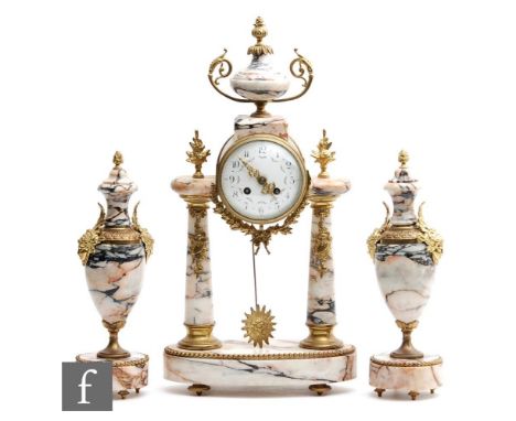 A 20th Century French gilt metal mounted veined marble clock garniture, eight day striking movement, on beaded oval base, the