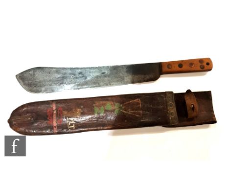 A World War Two machete and leather scabbard, the handle stamped with crows foot and no 8, the scabbard over painted PLT, 37c