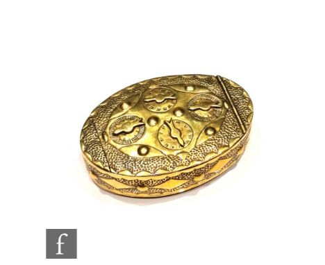 A 19th Century oval brass miners puzzle snuff box, the hinged top with four combination locks, lozenge border and base, 9cm d