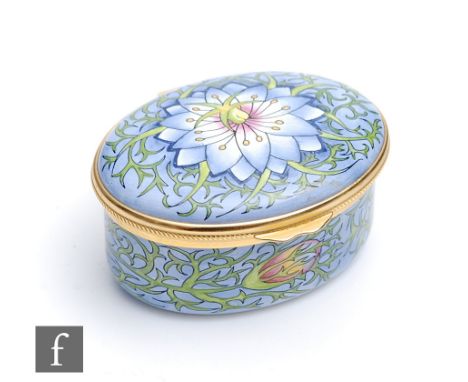 A Moorcroft Enamel oval box decorated in the Love in the Mist pattern designed by Rachel Bishop, printed mark, boxed, length 