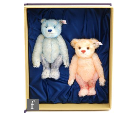 A Steiff 670367 Hello 2000 Goodbye 1999 Teddy Bear set, comprising blue and pink tipped mohair teddy bears, limited to year, 