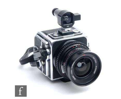 A 1980 Hasselblad&nbsp;SWC/M medium format Camera, chrome, serial number RS 142493, film back RS 3178782, with Biogon 1:4.5 f
