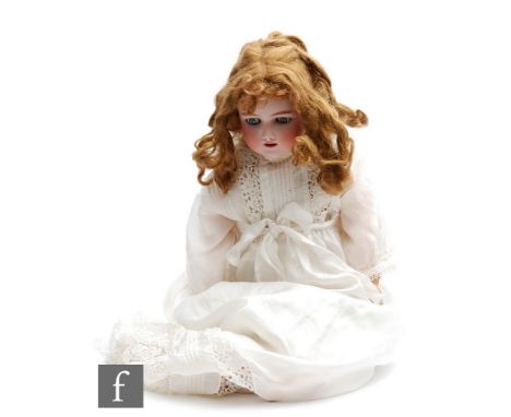 An early 20th Century Heinrich Handwerck bisque socket head doll, head produced by Simon &amp; Halbig, with sleeping blue eye