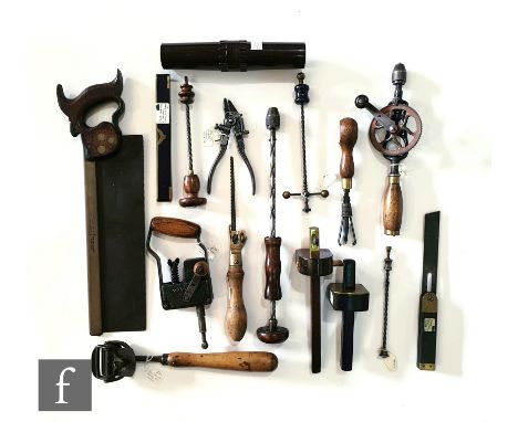 A collection of early tools to include an American Stanley box scraper, a British Rapper mechanical drill, hand drills, an Ar