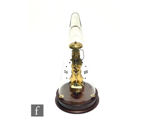 A 20th Century brass skeleton clock by Frank Hermle, No 791-081, the movement mounted on a mahogany platform, under a conical