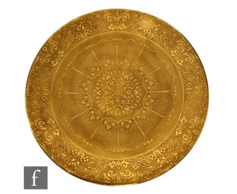 A Royal Worcester cabinet plate, the whole in gold with an overlay pattern, printed gold mark, diameter 24cm. 