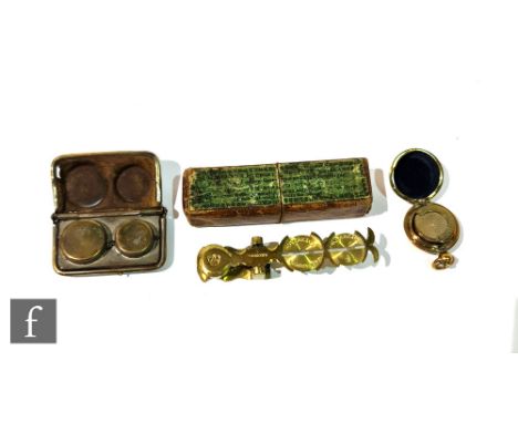 A 19th Century cased set of brass sovereign scales by Simmons, improved patent, a single brass fob watch type brass case and 
