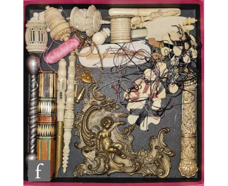 A collection of sewing tools to include straw work needle case, other cases, cotton winders etc. (qty) 