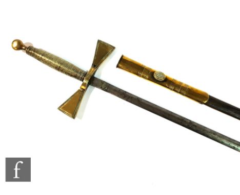 A late 19th to early 20th Century Maltese cross style dress sword, ribbed handle below a plain pommel, with brass mounted sca