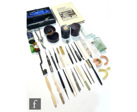 A collection of 19th to early 20th Century dentistry tools to include a cased Impactor Hallet tool set, extractor tool, brush