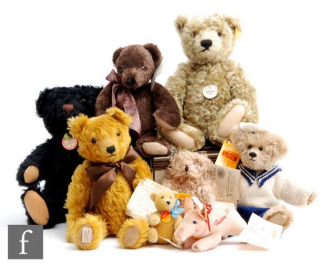 A collection of nine teddy bears, to include Steiff 408519 1953 Replica, Steiff 030232 Original Teddy Bear, Steiff 01075 Happ