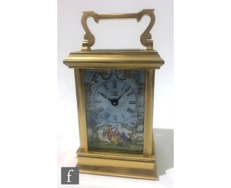 A Halcyon Days Enamels limited edition carriage clock, Toile de Jouy, the dial detailed with a scene of seated figures, numbe