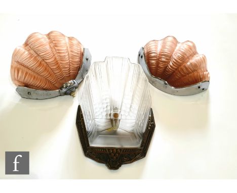 A 1930s wall light, of stylised Art Deco form in frosted glass, mounted in an Art Deco style metal mount, 23cm x 32cm, togeth