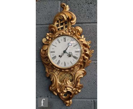 A 20th Century Cartel style gilt wall clock, eight day movement, circular white dial, height 60cm. 