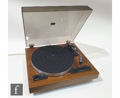 A Garrard DD75 record player&nbsp;direct drive transcription turntable with pickup arm, on veneered wooden plinth, with smoky