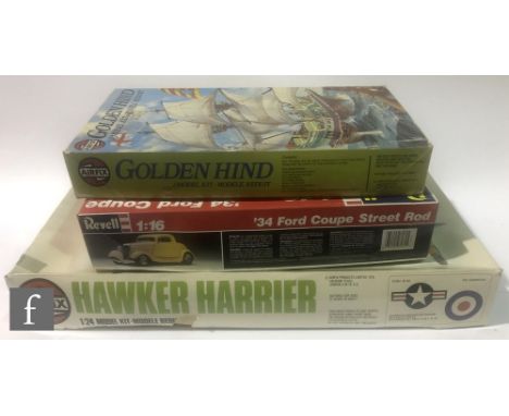 Three plastic model kits, Airfix 18001-4 Hawker Harrier 1:24 scale, Revell 7474 '34 Ford Coupe Street Rod 1:16 scale, and Air