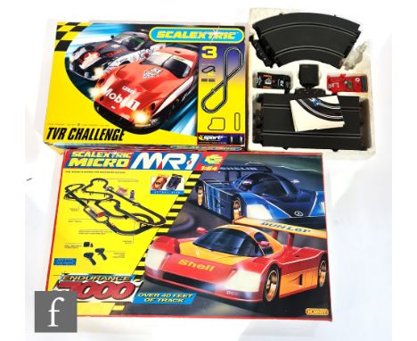 A collection of slot cars, comprising a boxed Scalextric Micro MR1 1:64 scale Endurance 7000 set, a boxed Scalextric TVR Chal