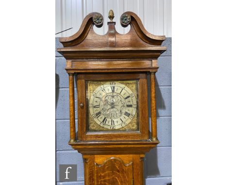 A late 18th to early 19th Century oak longcase clock with later associated 12 inch silvered dial with engraved centre with 'p