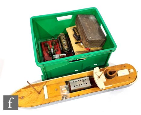 A collection of various Mamod items to include single cylinder steam plant, a wooden boat fitted with a Mamod engine, a power