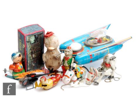 A collection of assorted tinplate and plastic toys, to include a Yanoman Space Scout S-17, a boxed Yoneya Coffin Bank, Alps C