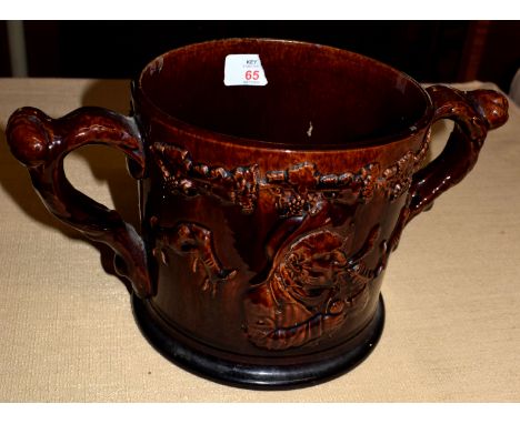 19th century Staffordshire treacle ground frog mug decorated in relief in typical style, the interior with two frogs in light