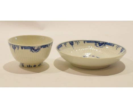 Worcester porcelain tea bowl and saucer with a blue bordered design  